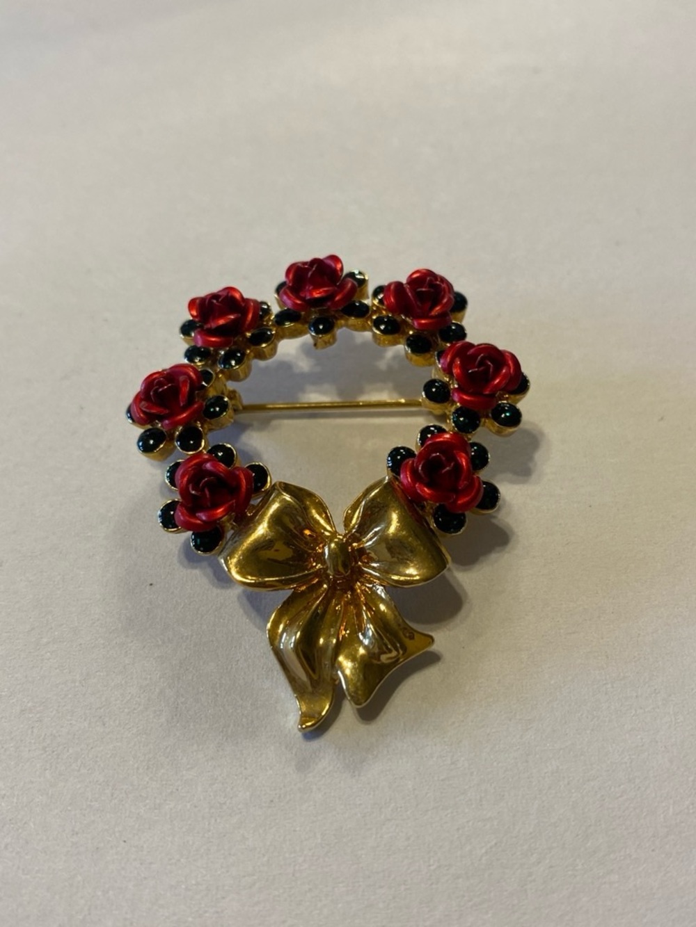 Vintage Avon Gold Bow Wreath Brooch with Red Rose Accents